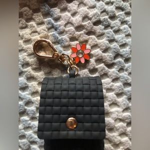 Hand sanitizer holder